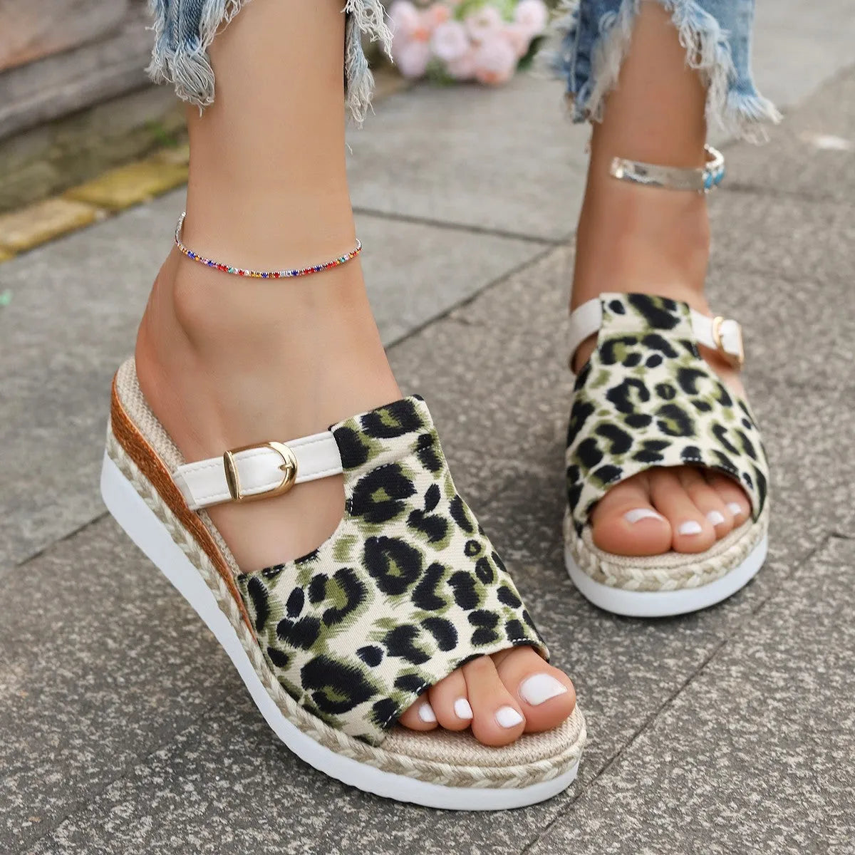 Leopard print wedge platform sandals with a fish mouth toe in light green.