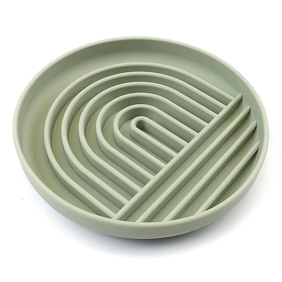 Silicone slow feeder dog bowl with ridge design, shown in beige colour, acting as a lick mat.