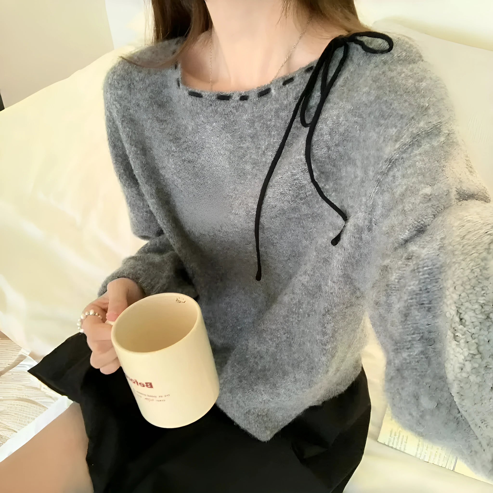 Women's loose-fitting knitwear pullover jumper in black and grey colours made from regenerated cellulose fibre