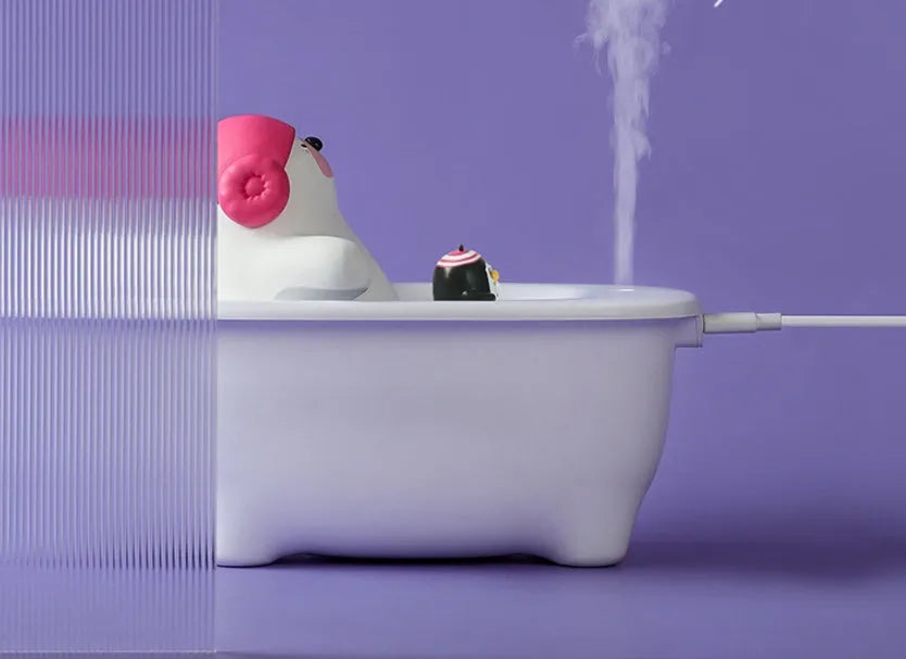 White USB air humidifier and aromatherapy diffuser with large water tank on a desk