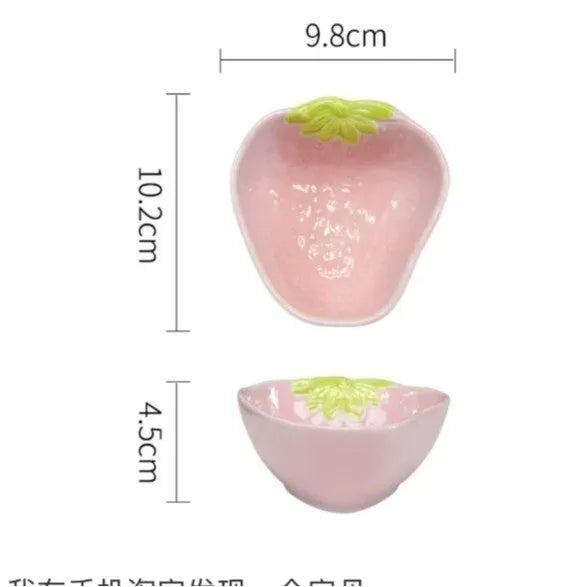Cute strawberry design porcelain dinnerware set with flower bowls, straw hat plates, and a twist spoon.