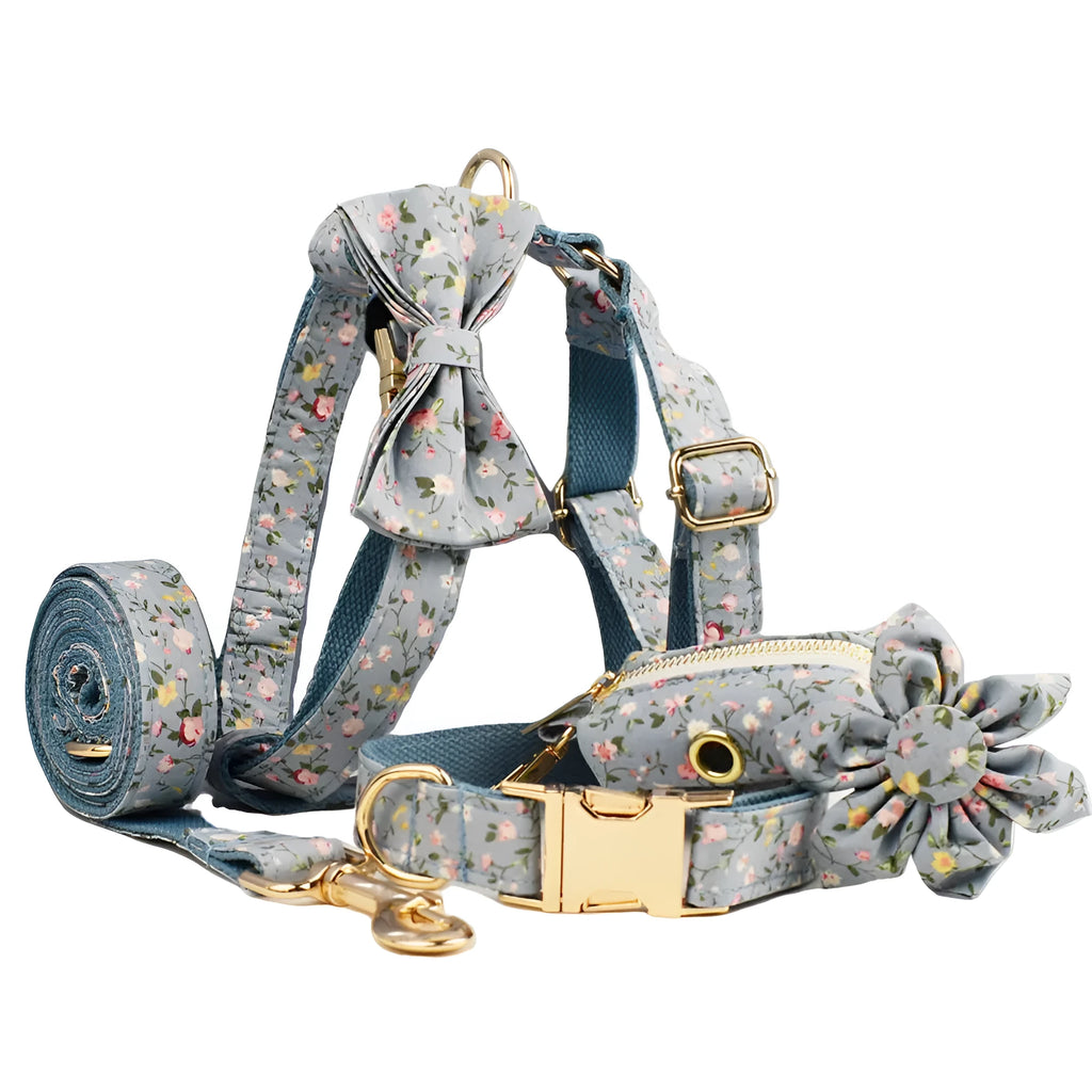 Floral polyester cotton dog collar set with matching leash, vest, bow, and poop bag accessories