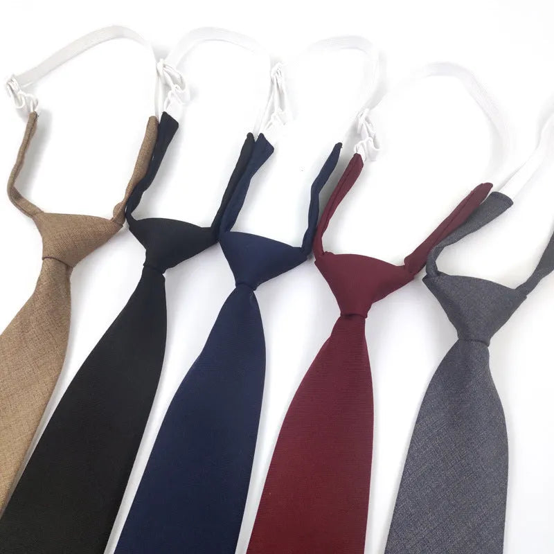 Men's solid colour cotton bow tie in arrow style showing navy blue option