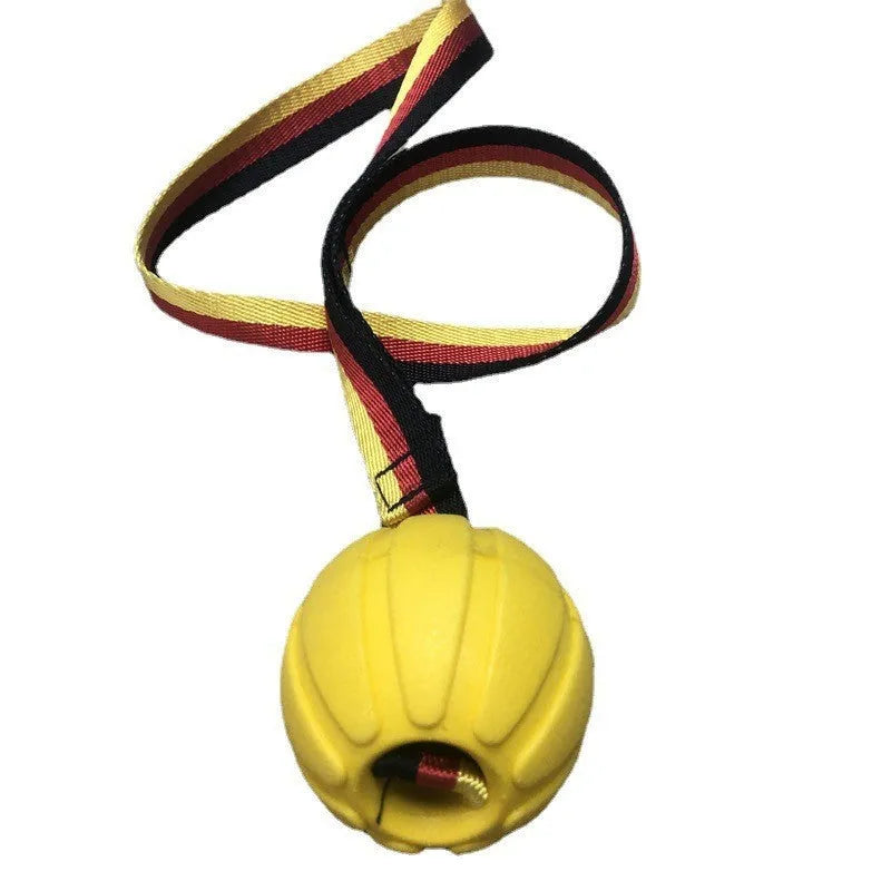 EVA floating pet tetherball toy in yellow and camouflage colours with string attachment