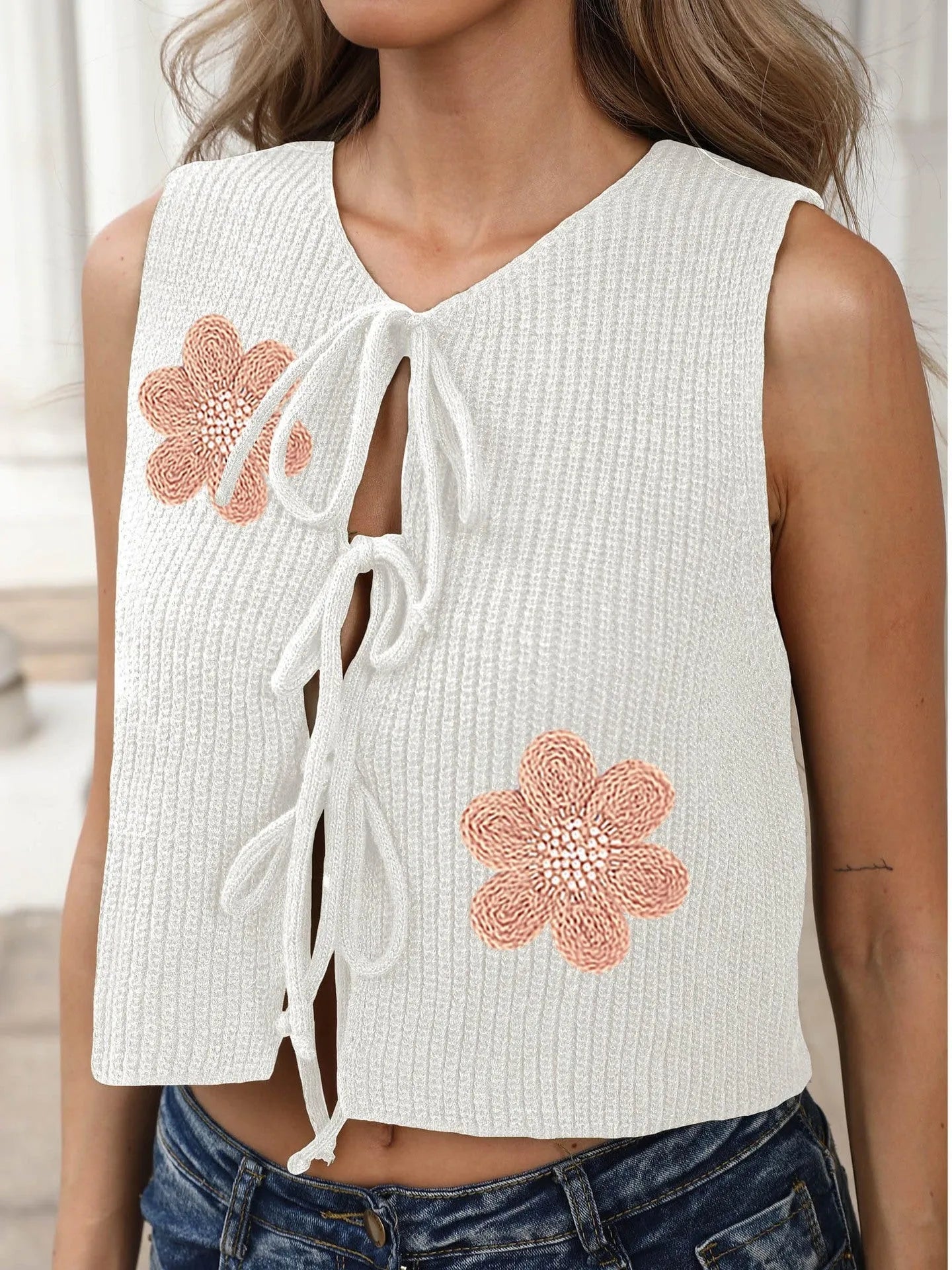 Ladies sleeveless cardigan vest with lace-up bow detail in deer plush polyester fabric with flower pattern