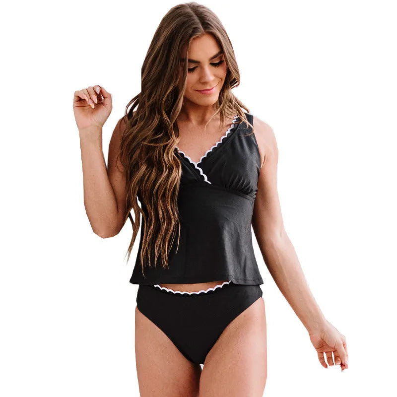 Black women's one-piece swimsuit with split front design and sleeveless cut