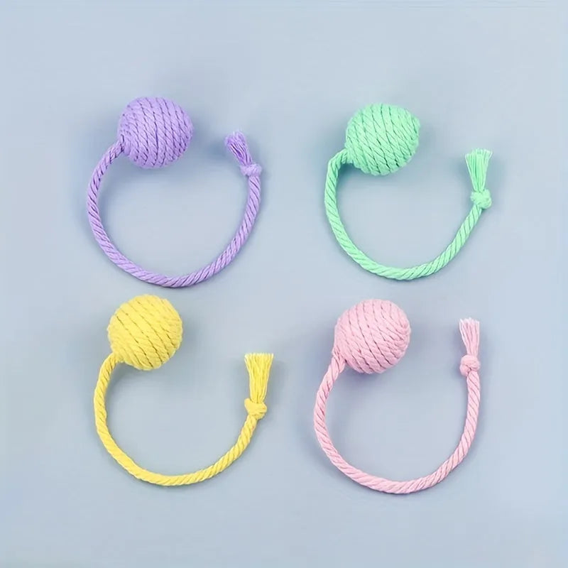 Colourful cat toy ball with rope handle and internal bell in 6cm or 3cm sizes
