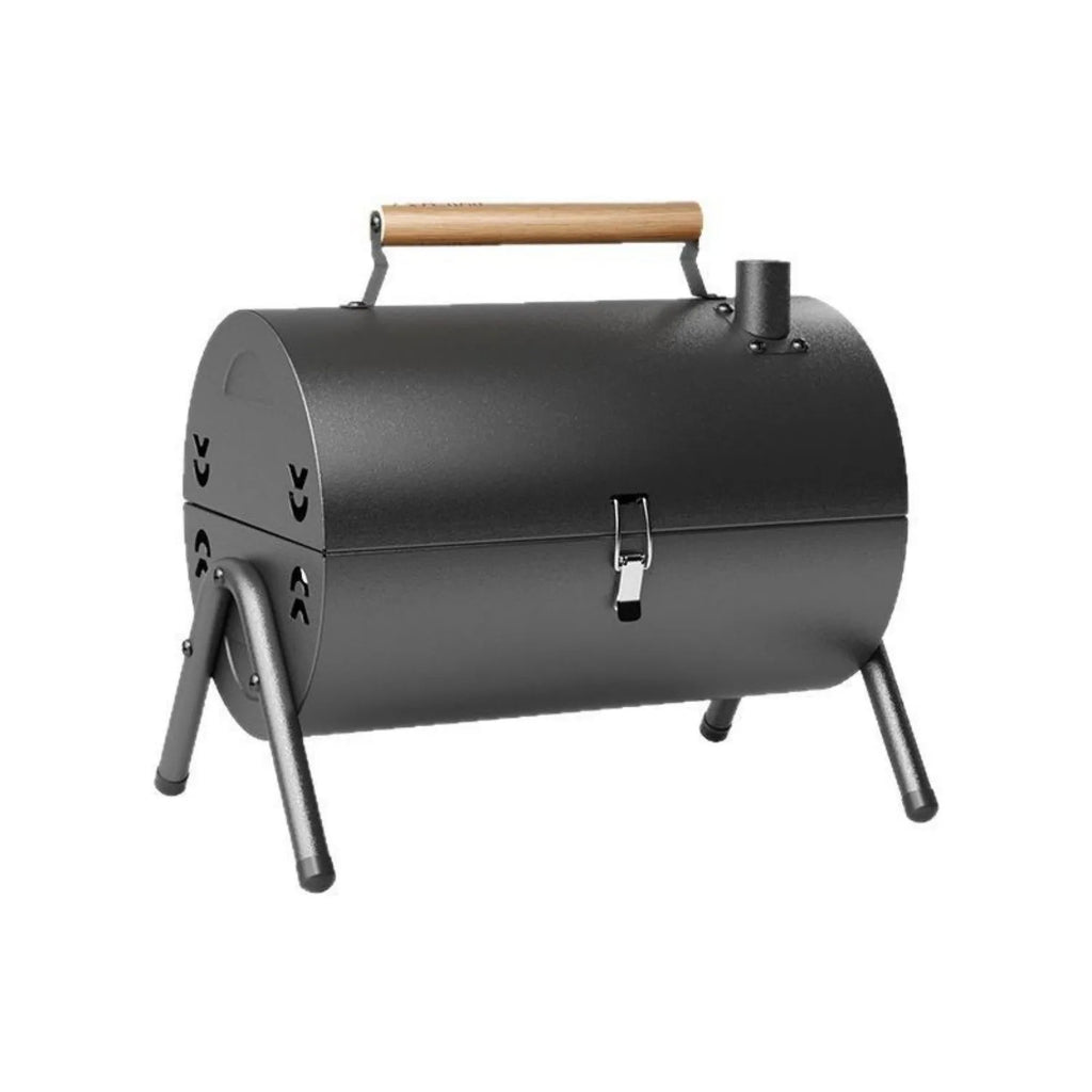 White portable barbecue grill with folding design and detachable carbon tanks for frying and baking.