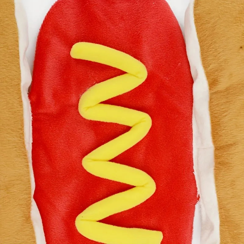 Brown and mustard coloured stuffed hot dog costume for a small dog, showing adjustable neck and waist fasteners.