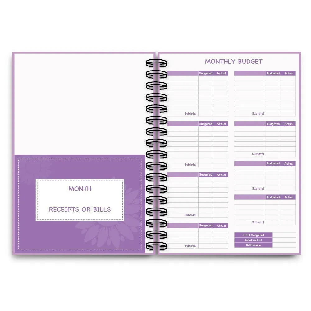 Purple coil-bound budget notebook with daolin paper pages, pen, stickers, and paper clips for financial planning