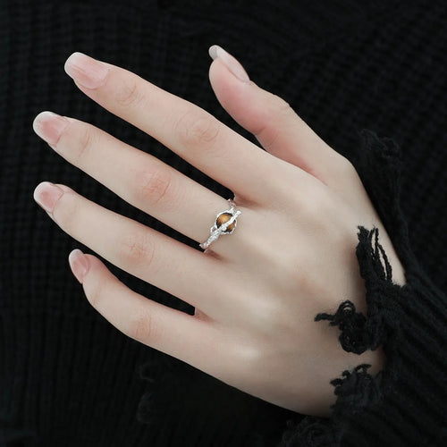 Adjustable opening Saturn ring in white gold colour electroplated silver with tigereye design