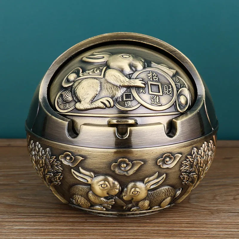 Alloy ashtray with smoke extinguishing slot in bronze finish featuring decorative dragon and phoenix design