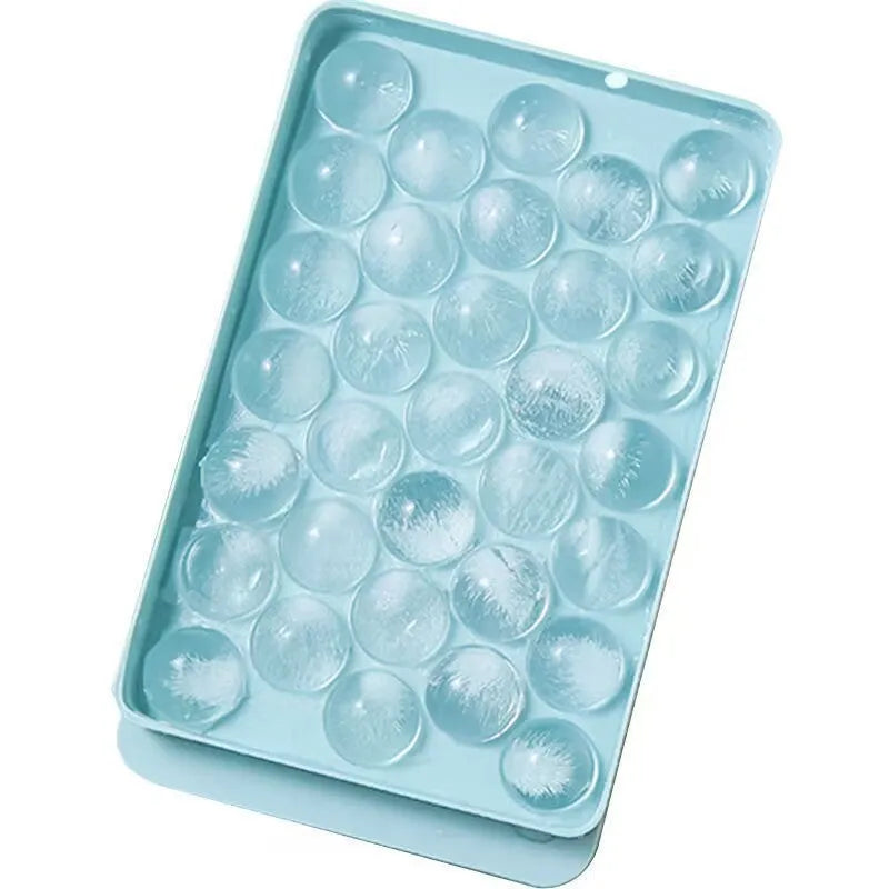 Blue silicone ice cube tray with lid showing 33 round grids, measuring 24x14x3cm