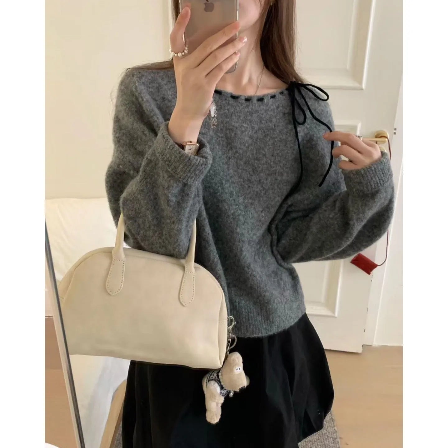 Women's loose-fitting knitwear pullover jumper in black and grey colours made from regenerated cellulose fibre