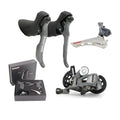 Road bike transmission kit showing aluminium alloy manual shifter, front derailleur and short-leg rear derailleur components