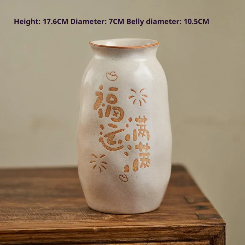 Chinese hand-painted ceramic vase with persimmon fruit designs on wooden desktop