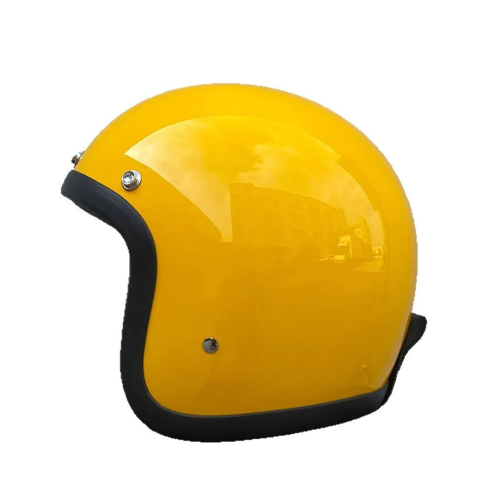 Retro-style half helmet for motorcycles with a fibreglass shell shown in a cement grey colour.