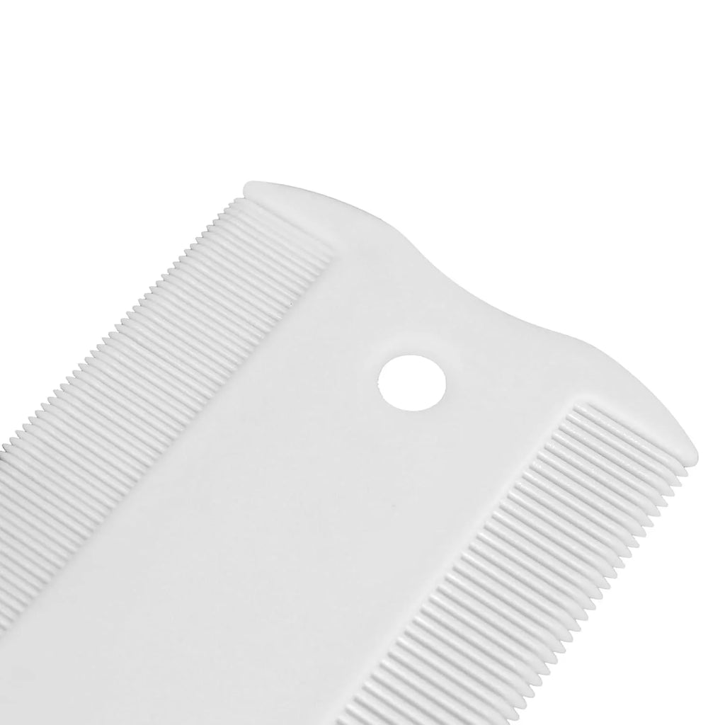 Small white plastic dual-sided pet flea comb for cats and dogs on a plain background.