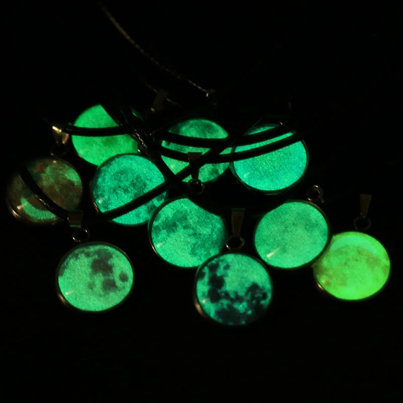 Luminous moon and constellation design pendant on an alloy necklace chain with extension.