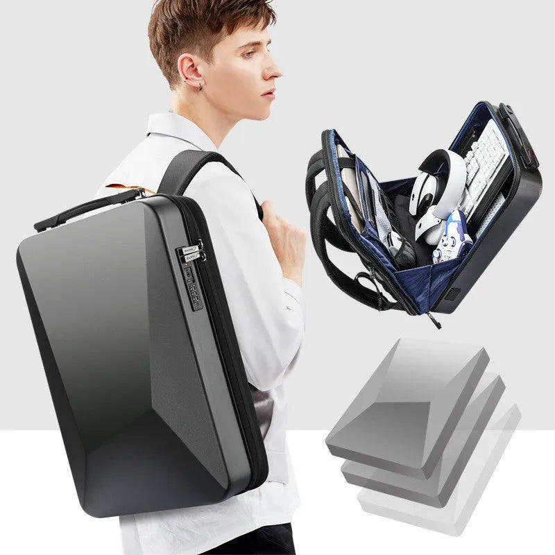 Large hard shell PC gaming backpack in black or silver with lock, showing dedicated laptop and organiser pockets