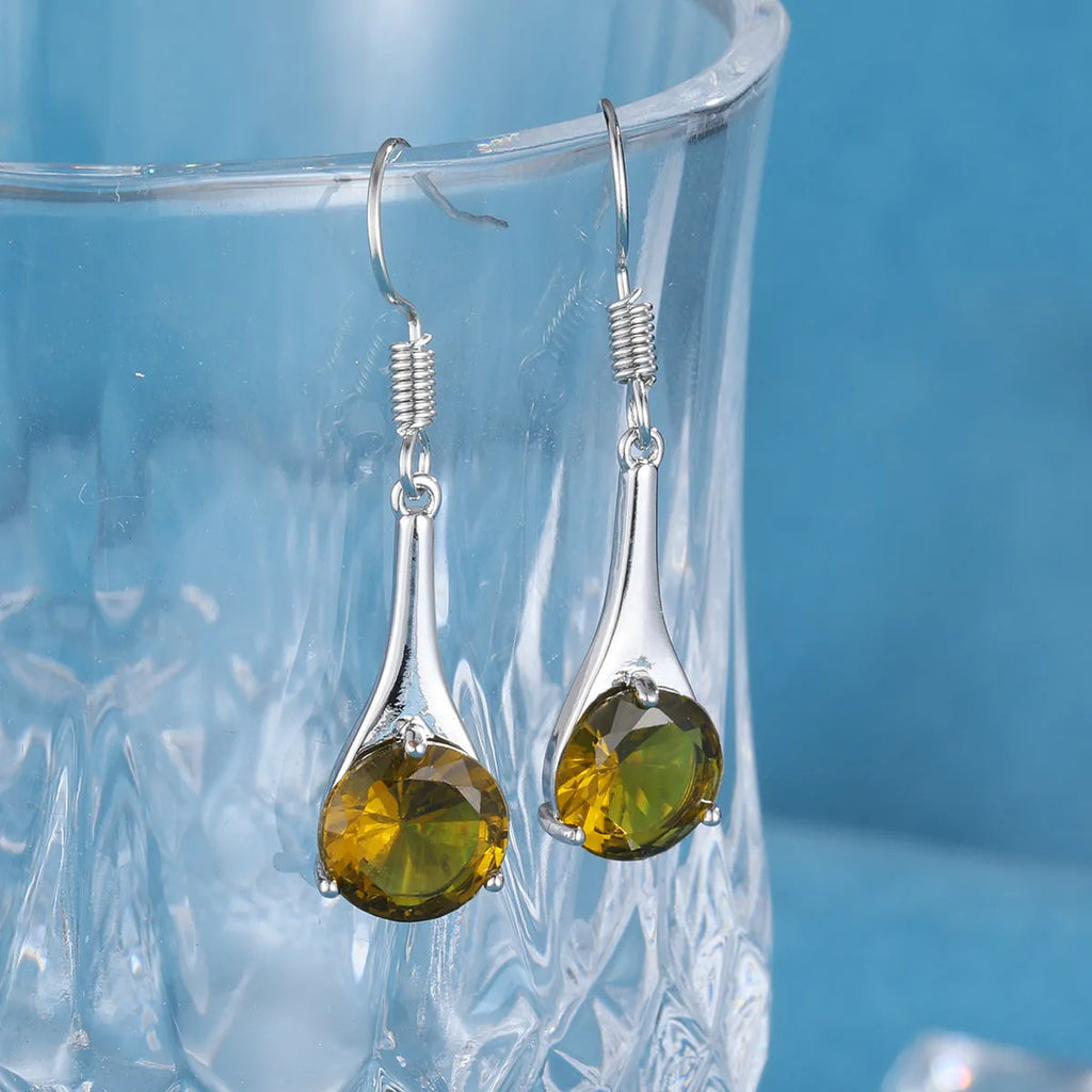 Olive green topaz water drop shaped earrings with retro design and electroplated alloy construction