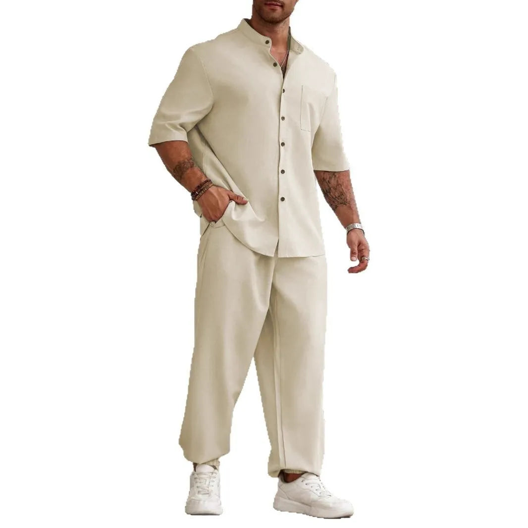 Men's casual apricot coloured cotton linen short sleeve shirt and trousers set laid flat.