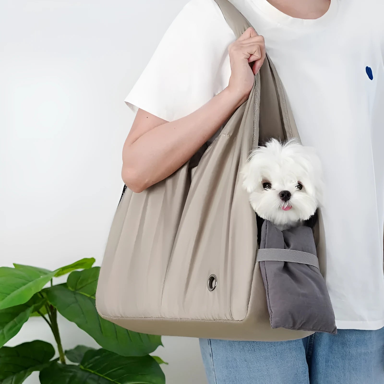 Apricot cloth pet carrier handbag showing portable design for pet transport