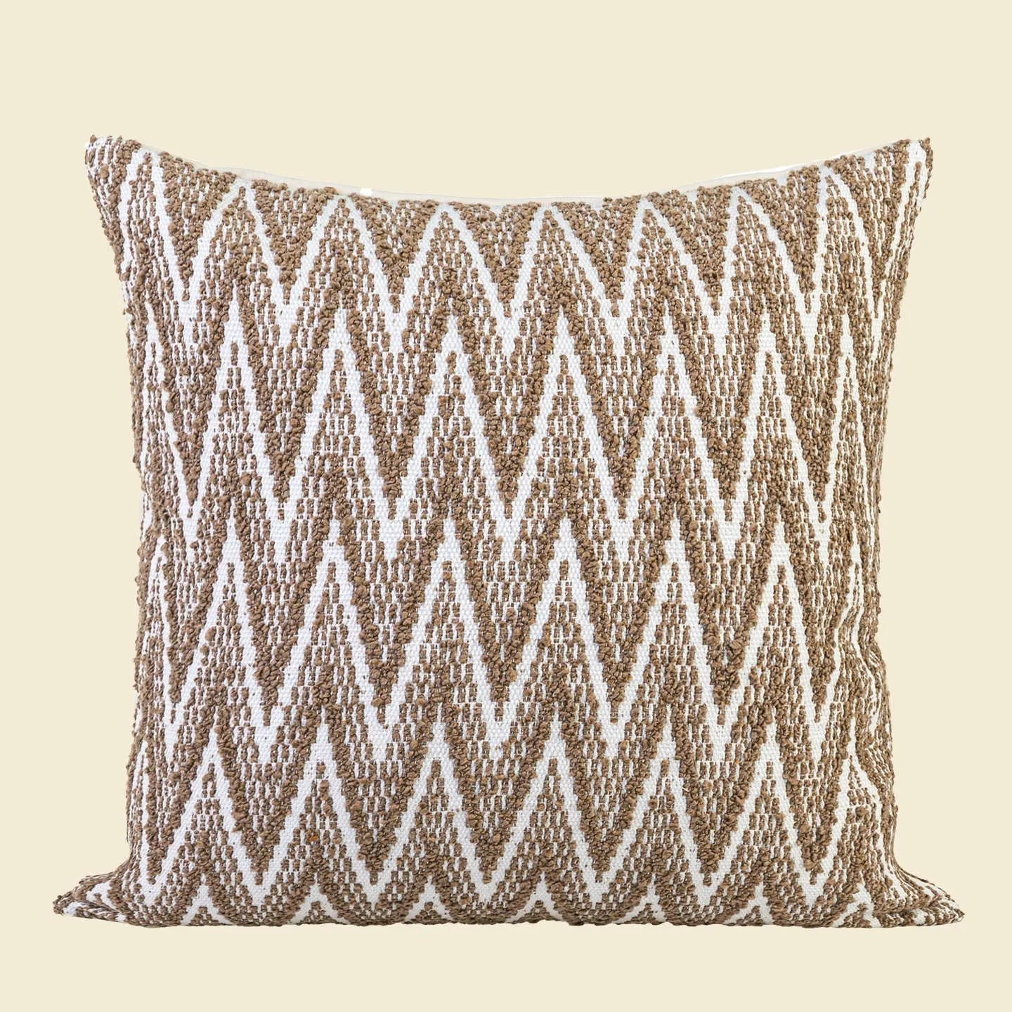 Chinese style square cushion in Maillard colour on a sofa, 45cm size with geometric pattern.