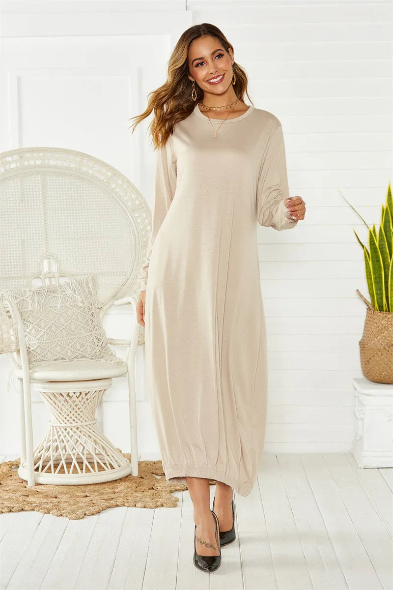 Black lantern dress with lace-up crew neck and loose silhouette casual knit fabric