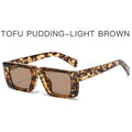 Y2K style sunglasses with UV400 protection in multiple colour combinations including black, grey, and transparent frames