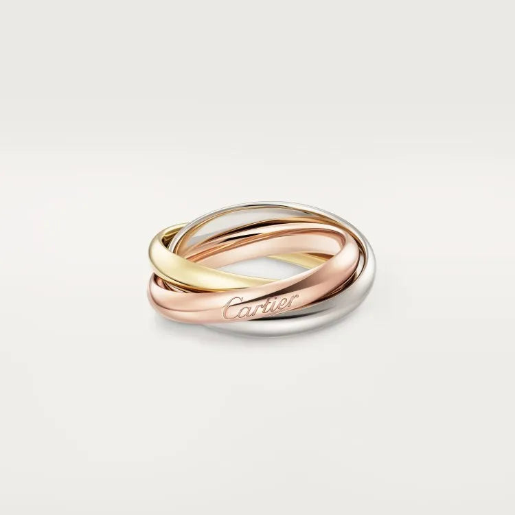 Silver couple rings showing full diamond setting and plain band options on a ring box.