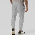 Men's casual track sweatpants in loose tapered straight-leg design showing army green colour option
