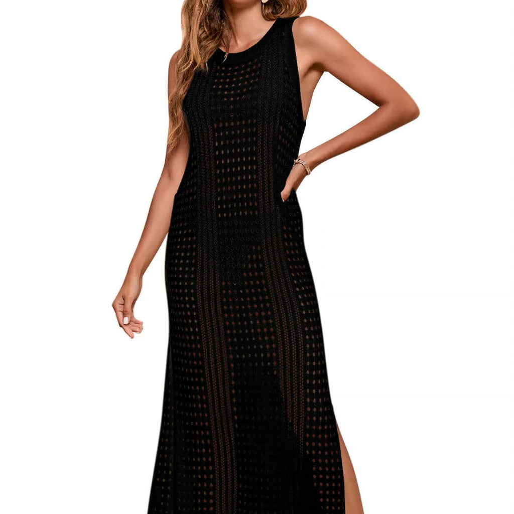 Long loose beach blouse in cotton blend fabric with hollow-out knitted design on a female model.