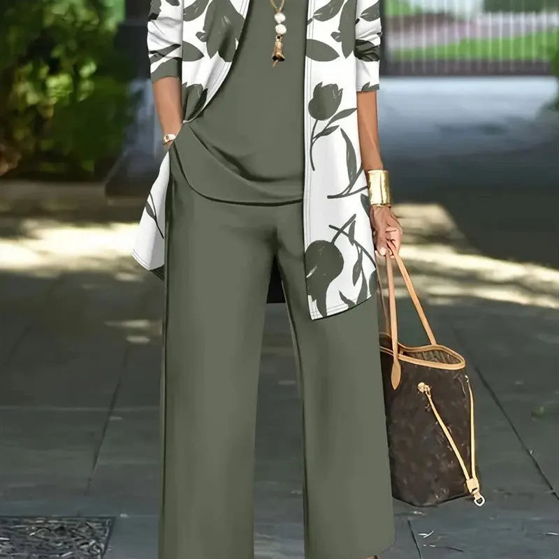 Women's blue Japanese Korean style three-piece suit comprising a long sleeve coat, vest, and trousers.