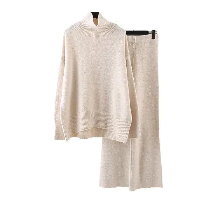 Women's beige acrylic sweater and wide-leg pants two-piece set laid flat.