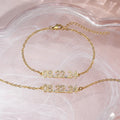 Stainless steel digital bracelet with diamond numerals on a metallic background.