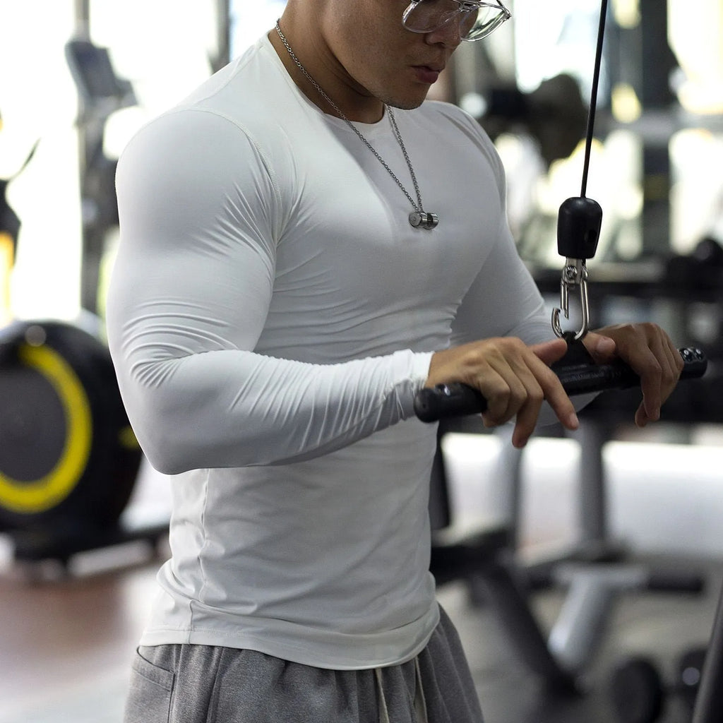 Men's long sleeve slim fit fitness tights in black and white colour options