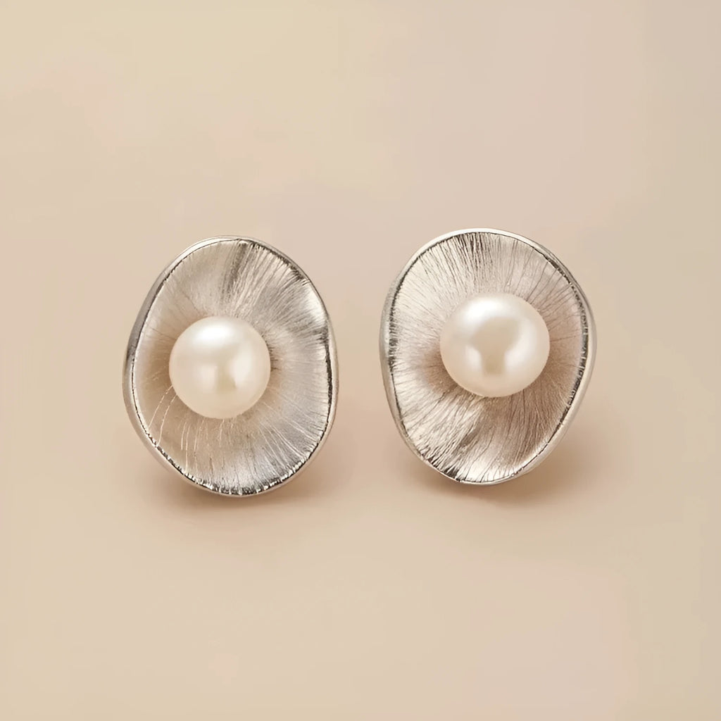 Gold tone geometric pearl stud earrings with sterling silver posts