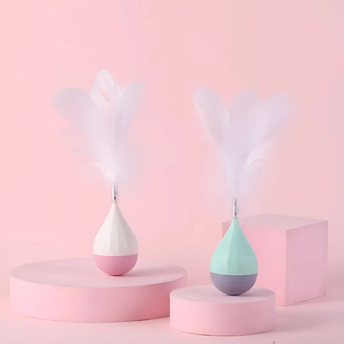 Green and pink feather tumbler cat toy with tease ball on stick