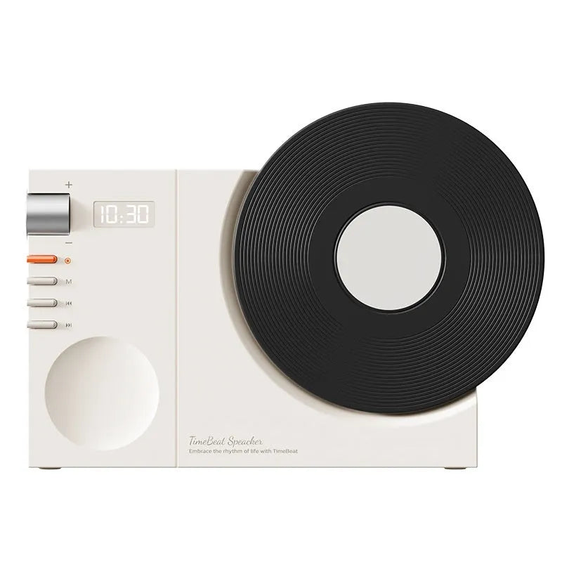 Mini Bluetooth portable speaker in Obsidian Black, Ivory White, Coral Pink or Plum Green colours with USB charging port