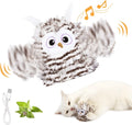 Grey plush owl automatic cat toy with beating wings on flat surface with USB charging cable