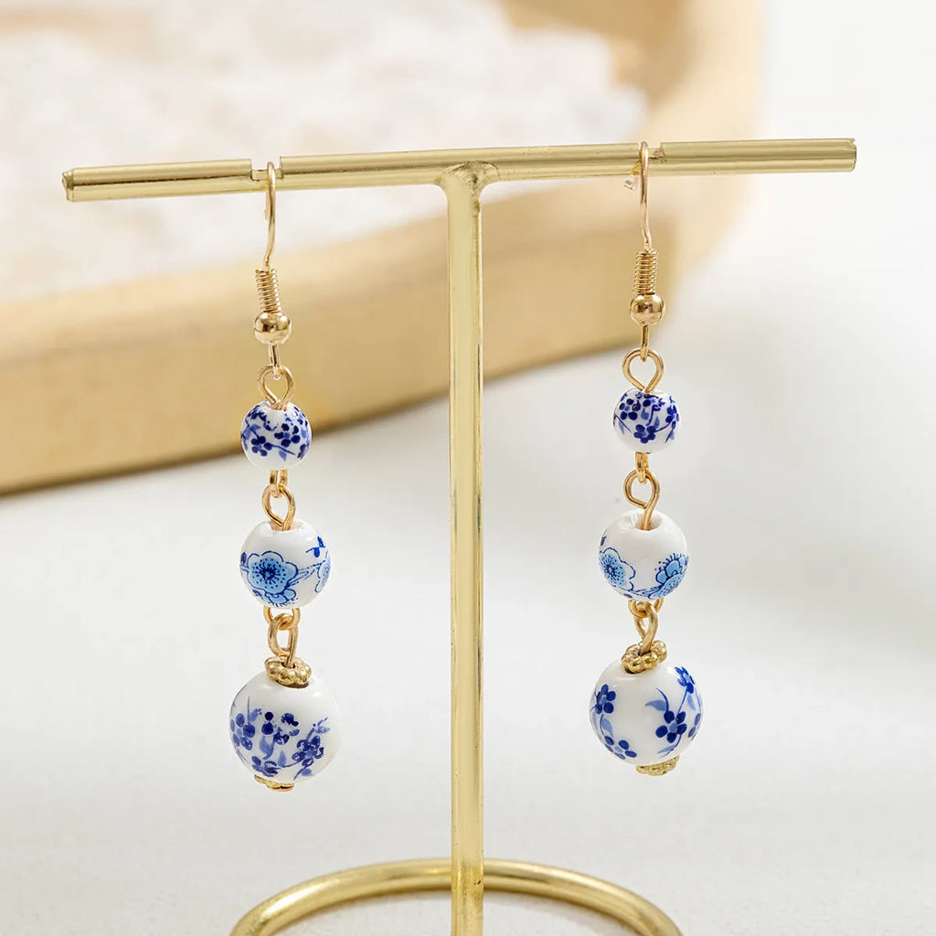 Blue and white porcelain ceramic bead geometric retro earrings with alloy construction