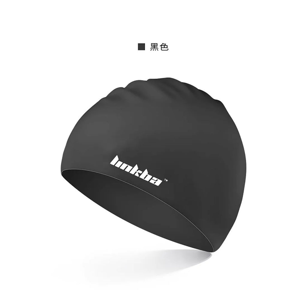 Silicone swimming cap with waterproof earmuffs in multiple colours on a blue background.