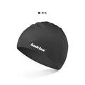 Silicone swimming cap with waterproof earmuffs in multiple colours on a blue background.