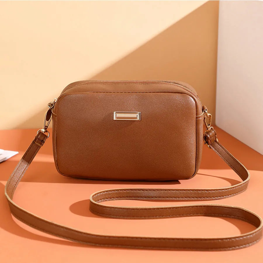 A square-shaped PU leather shoulder bag for women in an urban style, shown in multiple colour options.
