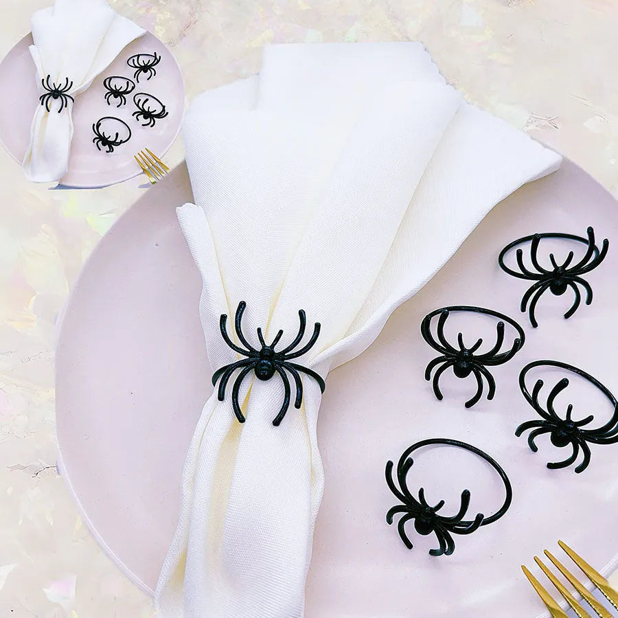 Set of six black spider Halloween napkin rings made from alloy material